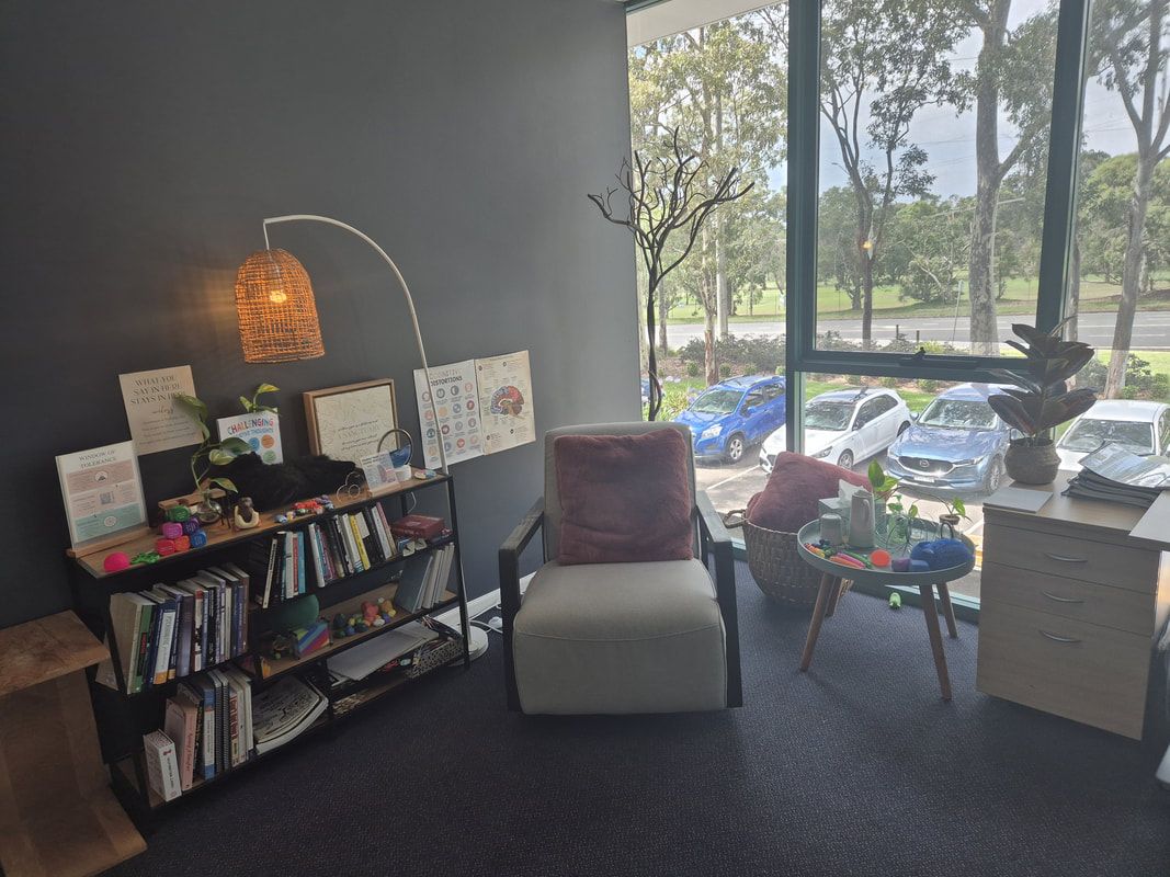 This picture shows Belinda's therapeutic room set-up. The armchair pictured on the left is typically where Belinda would be seated. The armchair closest to the window is where the client would typically be seated. The therapy pod is often used by adolescent and adult clients. 