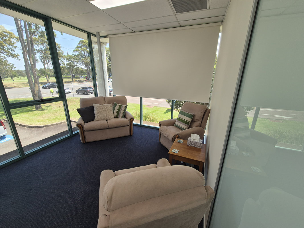 This picture shows Jenna's therapeutic room set-up. The armchairs pictured are where clients would typically be seated. Jenna would typically sit in the armchair that is pictured in the bottom right.